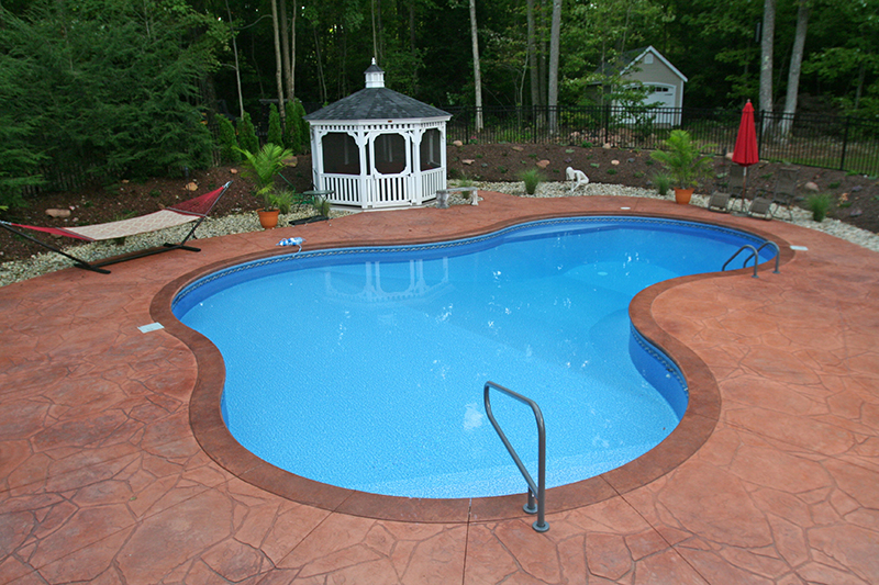 Swimming pool and stamped concrete project example 82